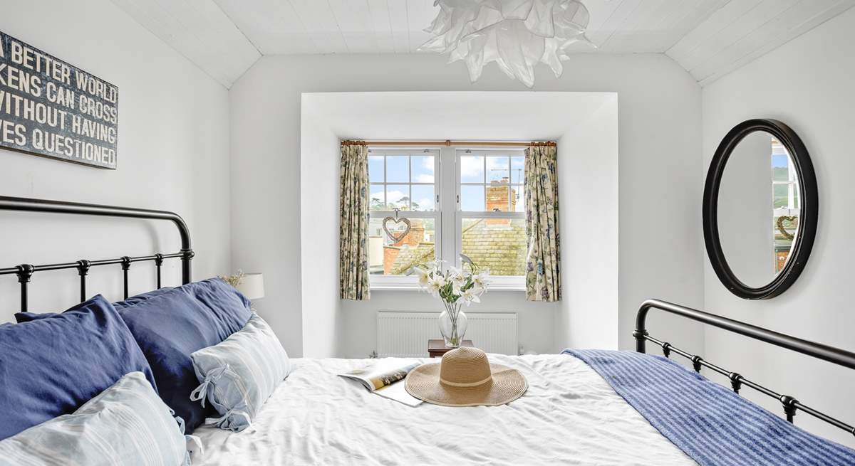 Retiring at night to this inviting king-size bed is always a treat.
