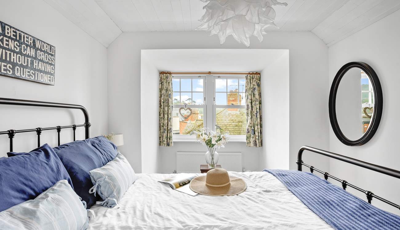 Retiring at night to this inviting king-size bed is always a treat.