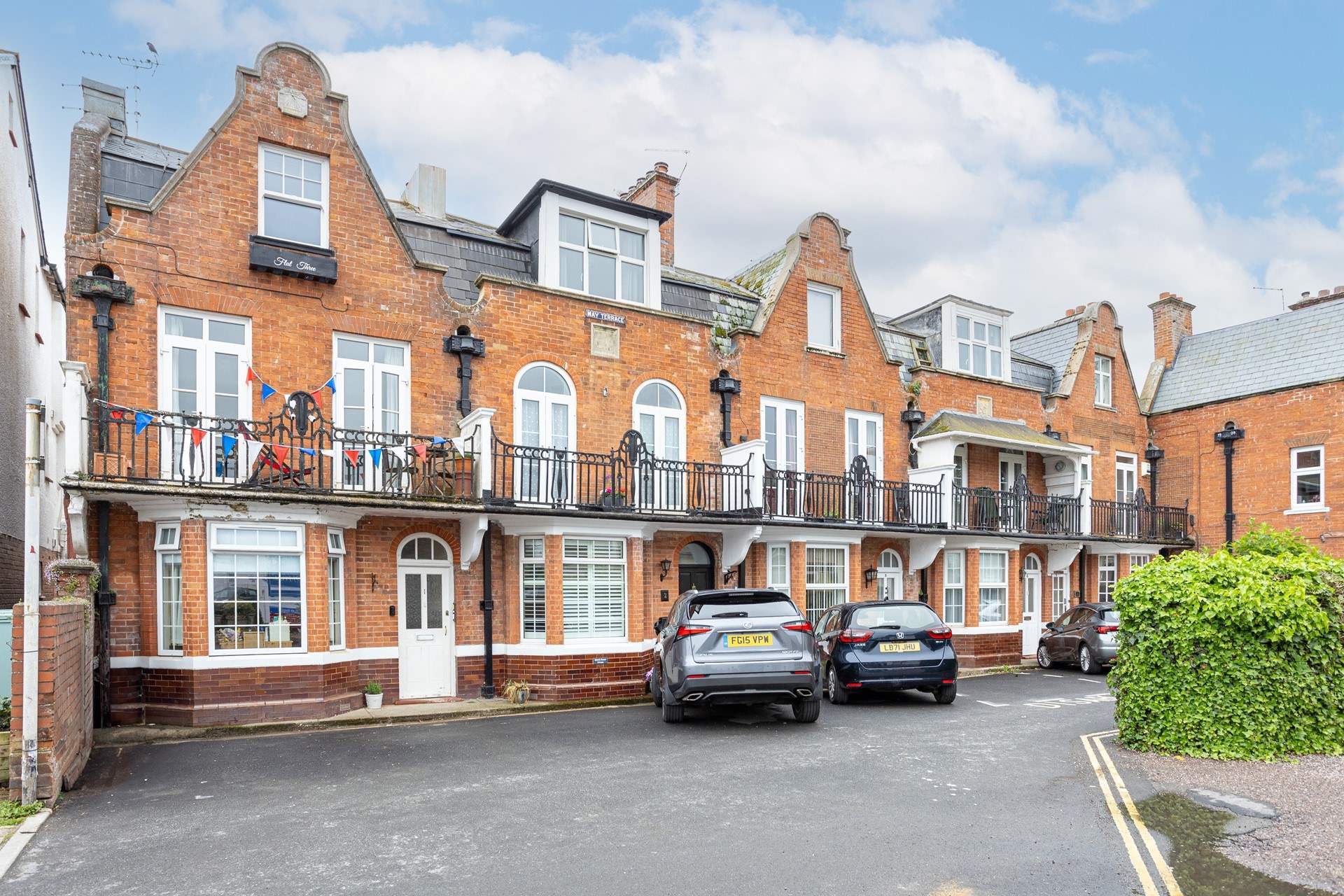 Your apartment is on the top floor. Neatly tucked away from the hustle and bustle below (there are five parking spaces available on a first come, first served basis).