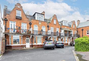 Your apartment is on the top floor. Neatly tucked away from the hustle and bustle below (there are five parking spaces available on a first come, first served basis).