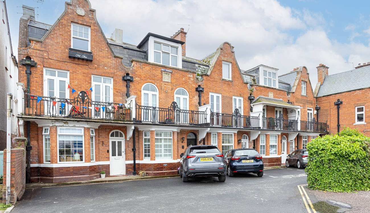 Your apartment is on the top floor. Neatly tucked away from the hustle and bustle below (there are five parking spaces available on a first come, first served basis).