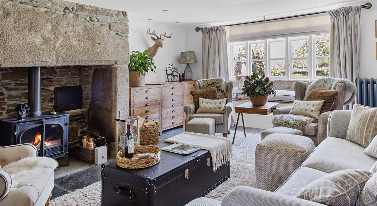 A room that offers the perfect spot to sit back, relax and light the wood-burner. 