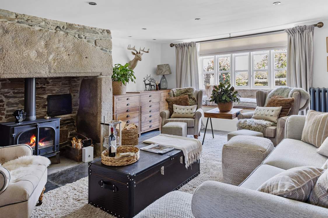 A room that offers the perfect spot to sit back, relax and light the wood-burner.