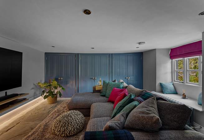 A snuggle sofa and a cinema room of delights.