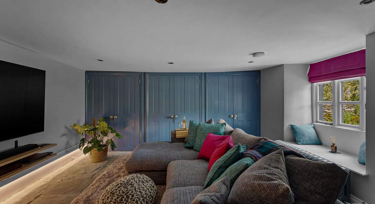 A snuggle sofa and a cinema room of delights.