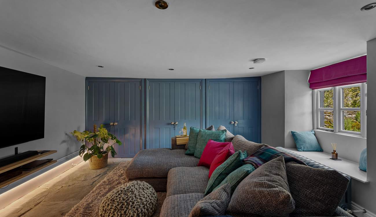 A snuggle sofa and a cinema room of delights.