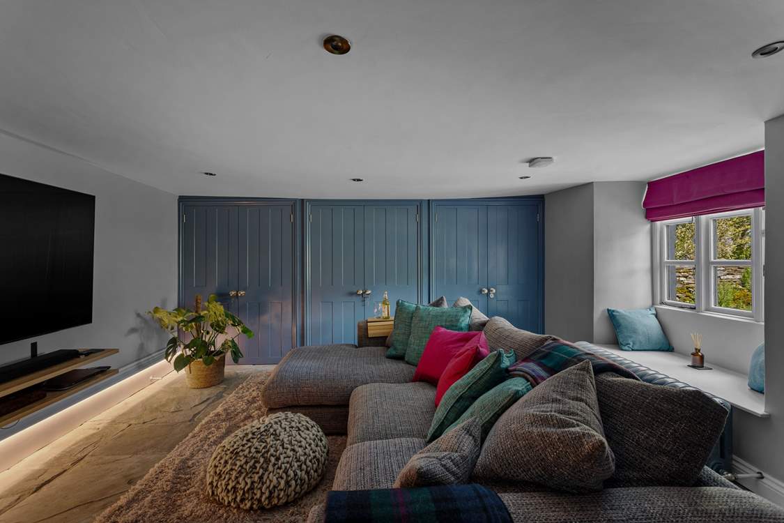 A snuggle sofa and a cinema room of delights.