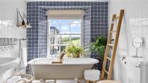 A roll-top bath always offers luxury.