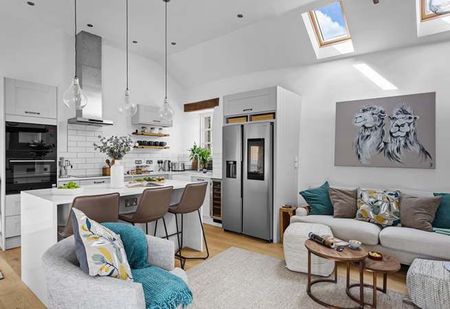 The first floor offers this fabulous fully refurbished open plan delight which leads directly out onto the top terrace where you will find the hot tub and outside kitchen.