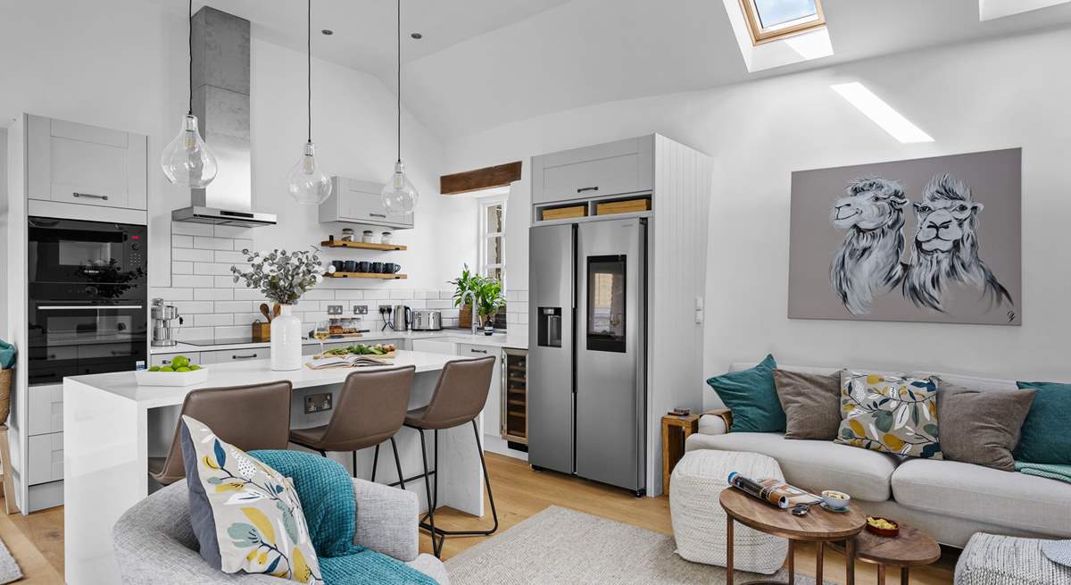 The first floor offers this fabulous fully refurbished open plan delight which leads directly out onto the top terrace where you will find the hot tub and outside kitchen.
