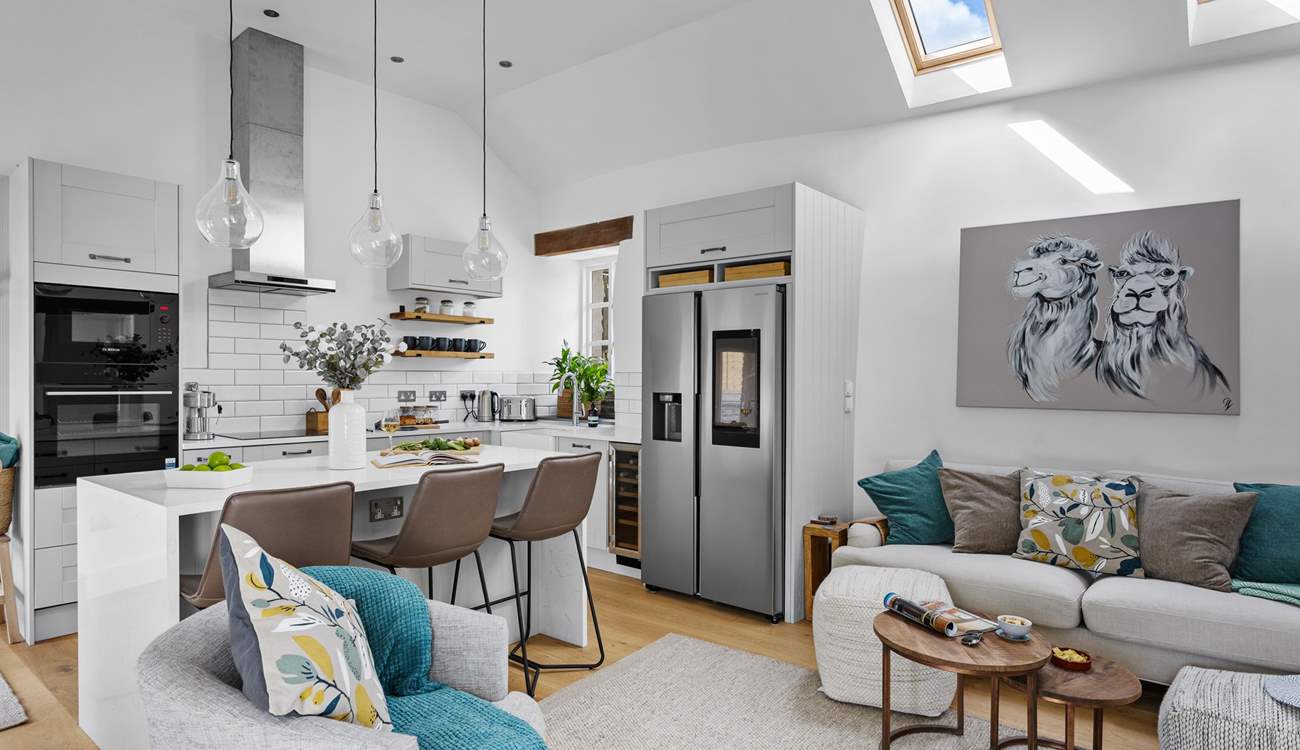 The first floor offers this fabulous fully refurbished open plan delight which leads directly out onto the top terrace where you will find the hot tub and outside kitchen.