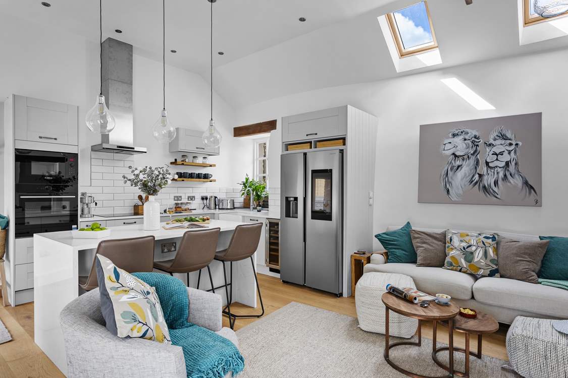 The first floor offers this fabulous fully refurbished open plan delight which leads directly out onto the top terrace where you will find the hot tub and outside kitchen.