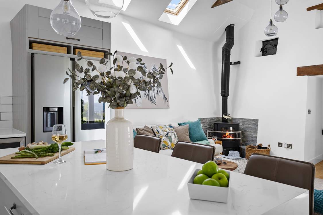 The wood-burner offers a touch of luxury.