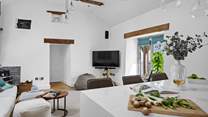 This room has a Smart TV making it the perfect spot for the children to sit whilst the family enjoy the terrace. 