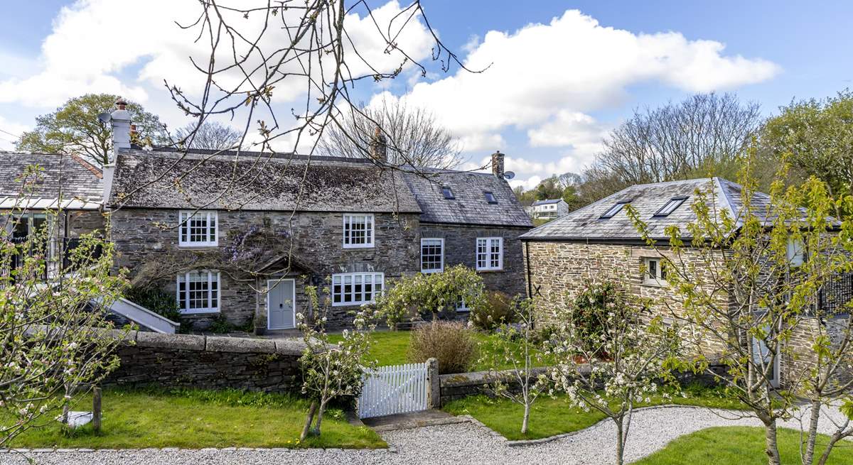The main farmhouse sits behind The Aval Loft, to the right of the picture, in a gorgeous rural setting.