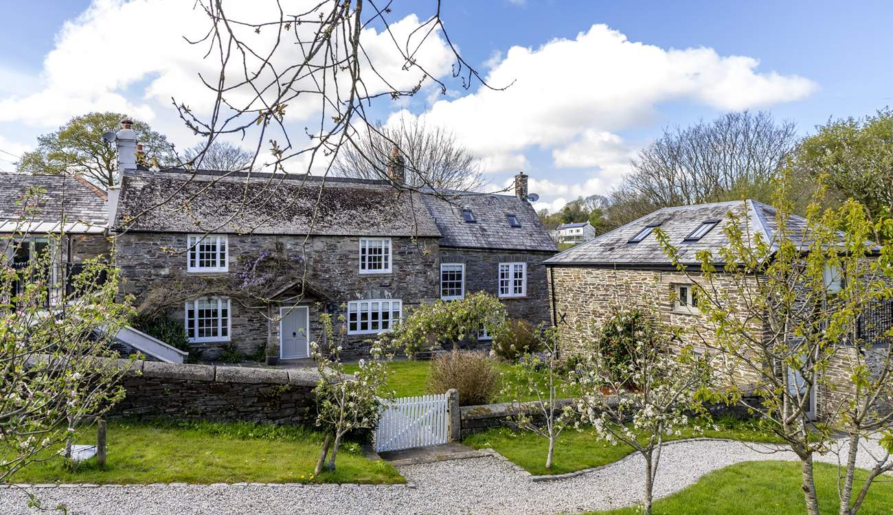 The main farmhouse sits behind The Aval Loft, to the right of the picture, in a gorgeous rural setting.