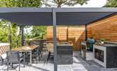 What could be better than cooking a feast in the outdoor kitchen and dining al fresco under the bespoke pergola. - Thumbnail Image