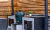 The granite worktops offer a luxurious finish to the outdoor kitchen. - Thumbnail Image