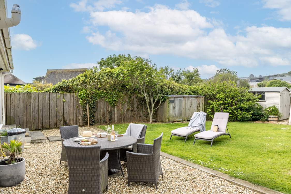 Enjoy dining al fresco in the large garden.