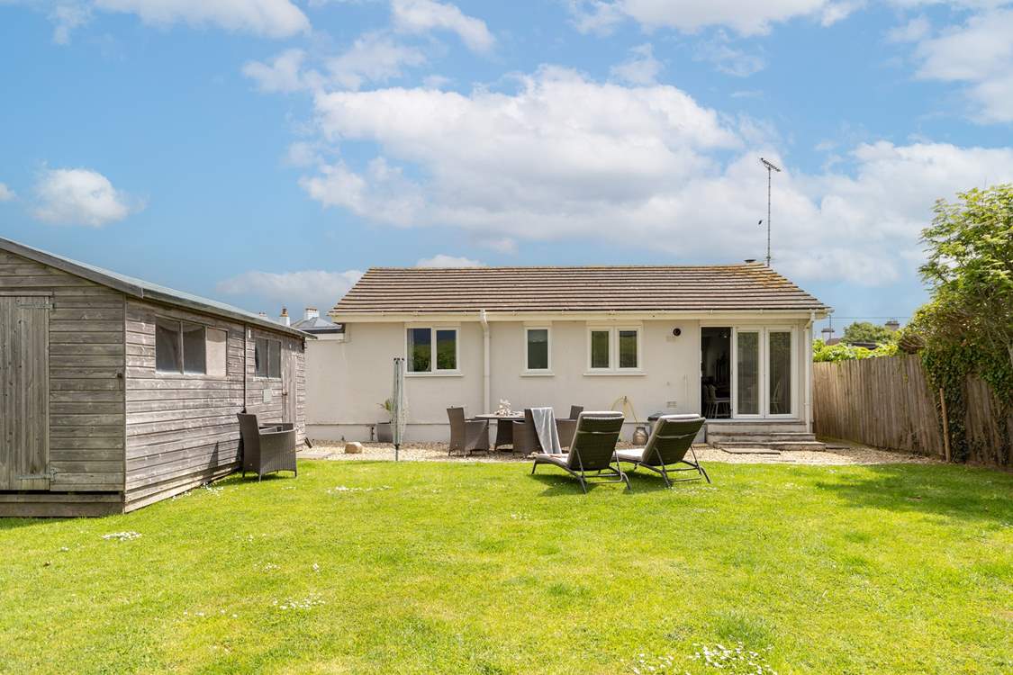 A lovely back garden awaits your return at the end of each day with table tennis in the garden outhouse.