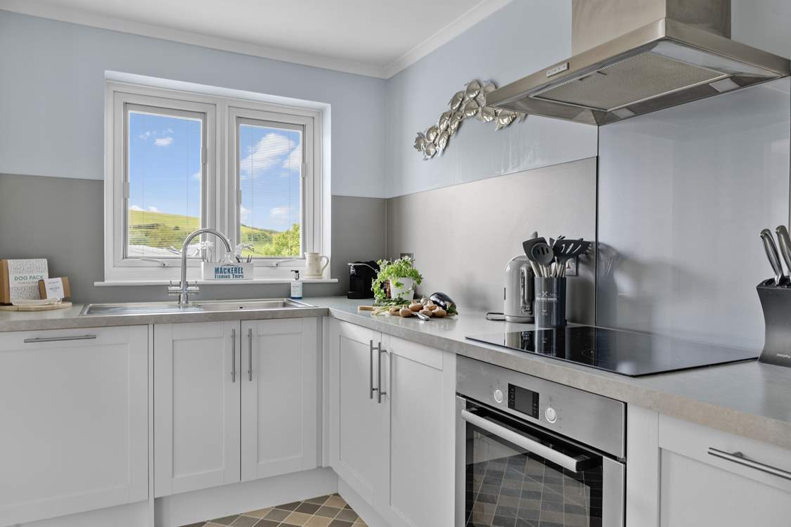 A sleek modern kitchen offers all that's needed for the best of self catering.
