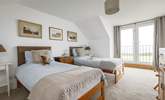 First floor twin room with Juliet balcony and views to the sea. - Thumbnail Image