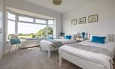 The front twin bedroom also has a sea view and plenty of wardrobe space to unpack and unwind. - Thumbnail Image