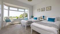 The front twin bedroom also has a sea view and plenty of wardrobe space to unpack and unwind.