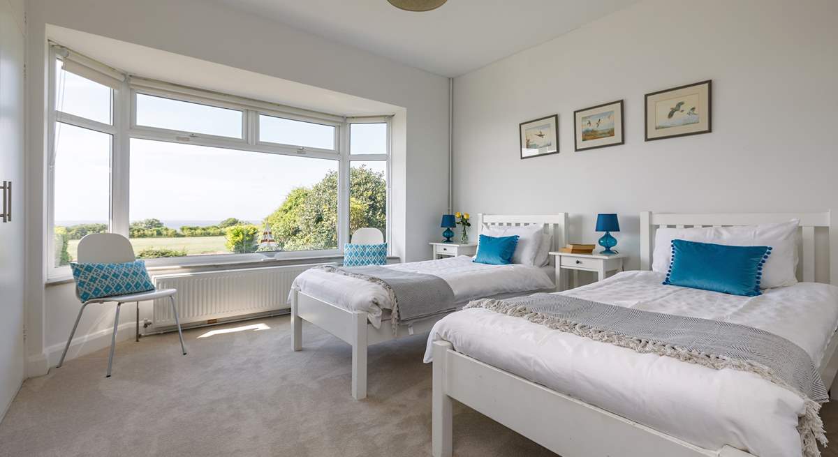 The front twin bedroom also has a sea view and plenty of wardrobe space to unpack and unwind.