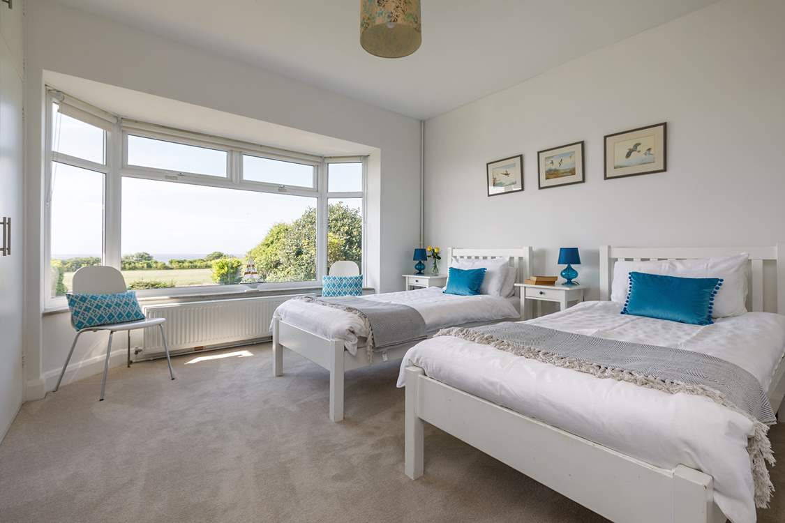 The front twin bedroom also has a sea view and plenty of wardrobe space to unpack and unwind.