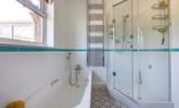 A delightful corner shower in this spacious room. - Thumbnail Image