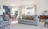 Large windows throw in so much light and of course the sea view from your sofa. - Thumbnail Image