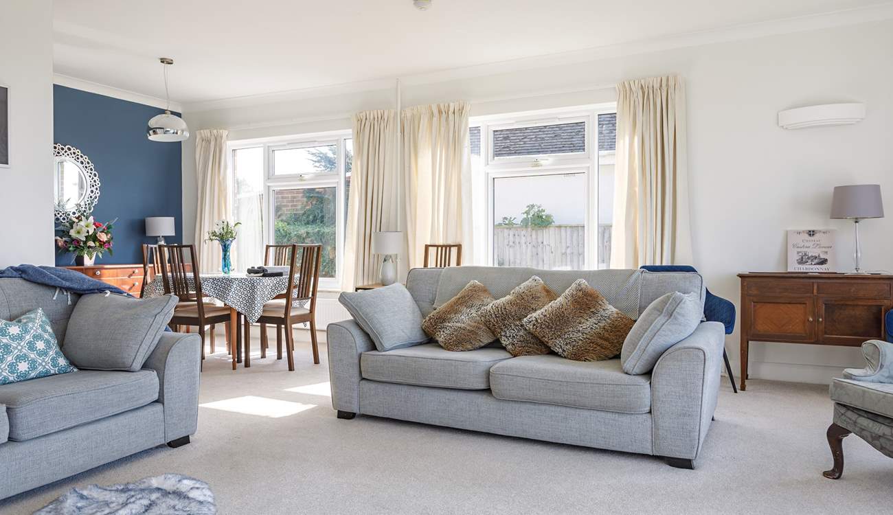 Large windows throw in so much light and of course the sea view from your sofa.