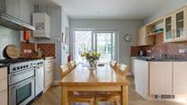 Look out into the conservatory from the light-filled kitchen.