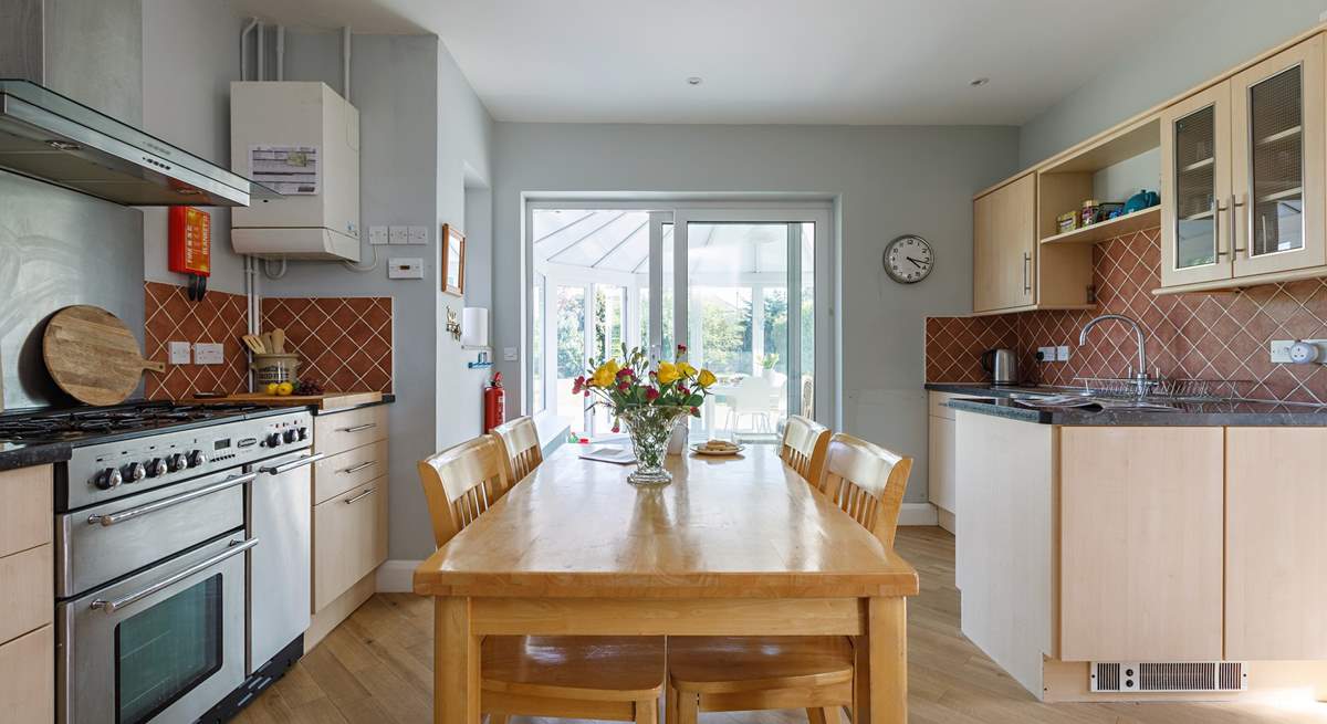 Look out into the conservatory from the light-filled kitchen.