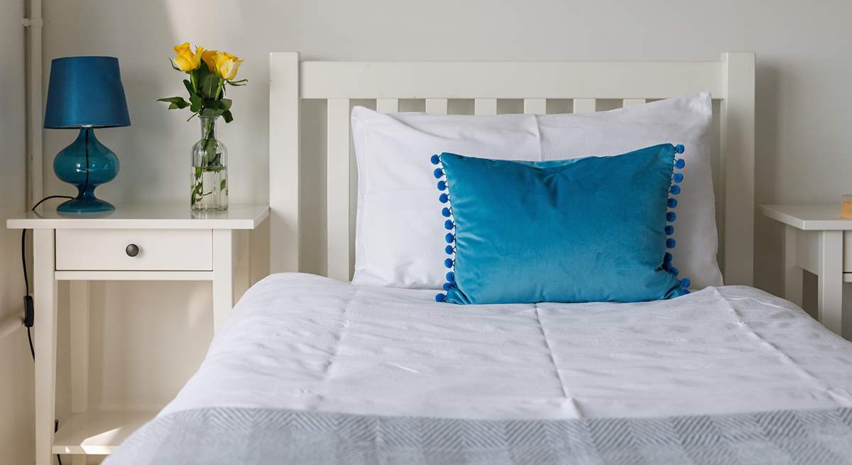 Another light and roomy downstairs twin bedroom.