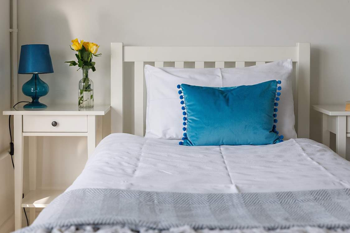 Another light and roomy downstairs twin bedroom.