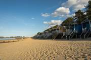 Wells-next-the-Sea, a lovely trip out with soft sands, beach huts and lanes of intriguing shops to discover.