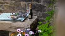 This lovely old stone bench is a place for quiet contemplation. 