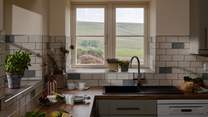 Just look at that view, no arguing over who washes up!