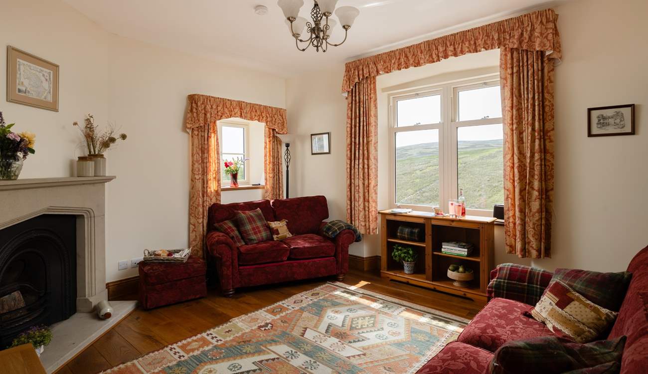 The sitting-room is just the place to watch the changing light over the hills. 