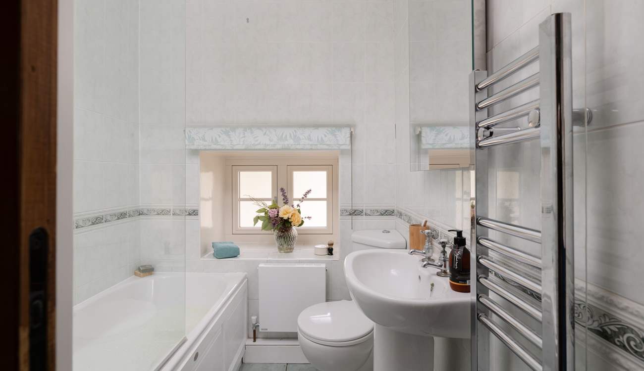 The bathroom has a bath with shower over, just the place for a long soak after hiking over the Dales. 