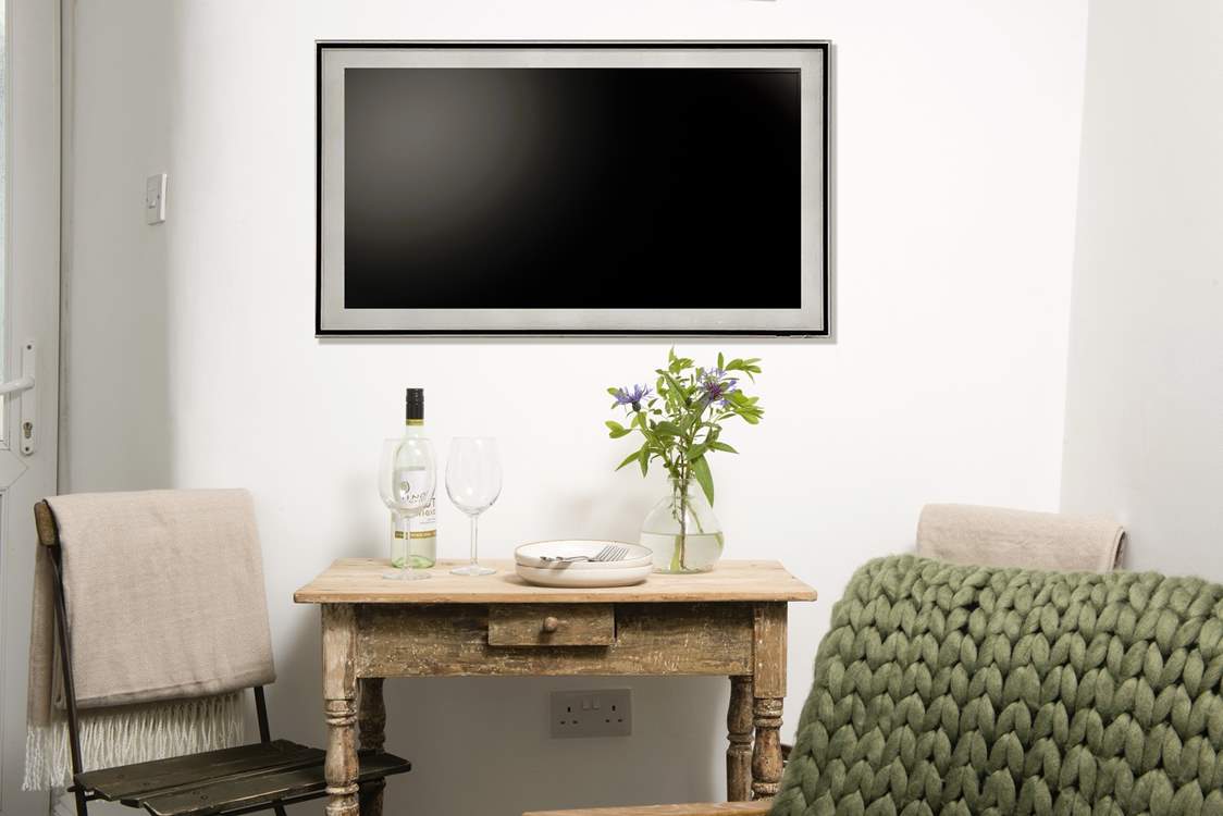 The cosy dining-table for two, perfect for romantic meals.