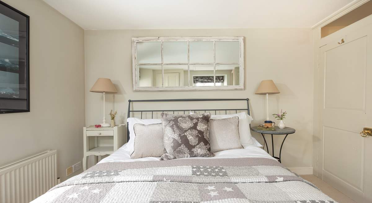 Three charming bedrooms await.