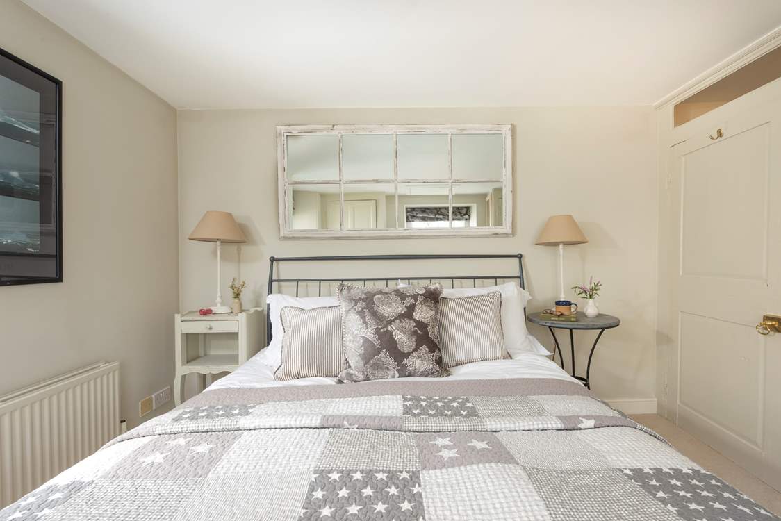 Three charming bedrooms await.