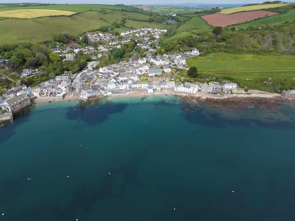 Lush green pastures and woodlands embrace the coastal setting of Kingsand and Cawsand.