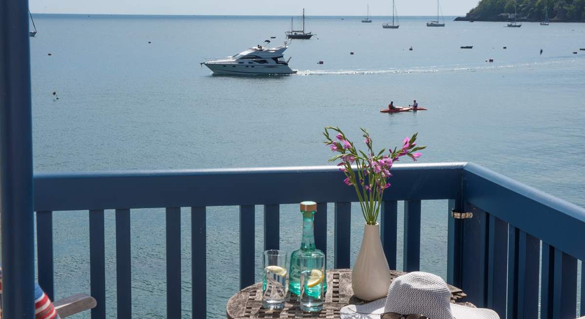 Watch the comings and goings along the water.