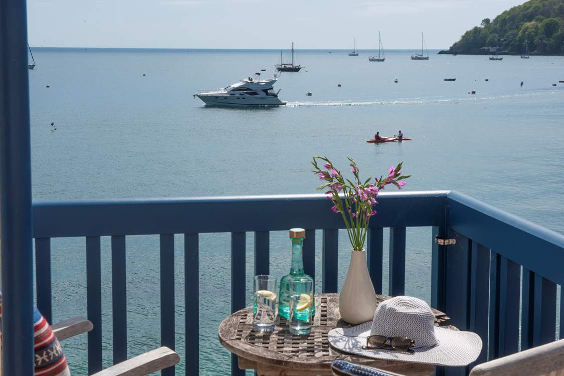 Watch the comings and goings along the water.