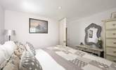 Gentle shades of grey and cream in the third bedroom. - Thumbnail Image