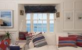 Chill out on the window seat and gaze out to sea. - Thumbnail Image